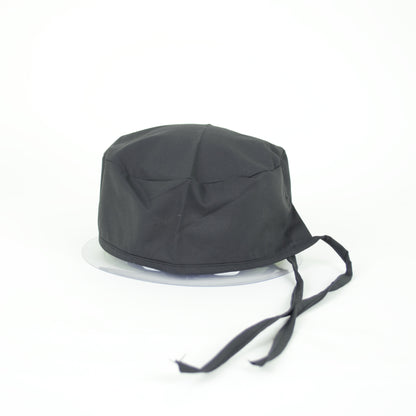 black scrub cap.